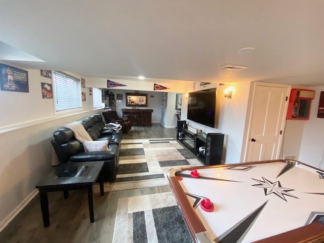 1702 Elm Street Spring Grove, IL 60081 - Photo 24 of 30 a living room with furniture and a flat screen tv