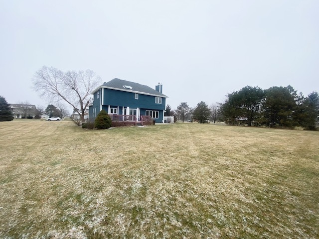 1702 Elm Street Spring Grove, IL 60081 - Photo 27 of 30 a view of a house with a yard