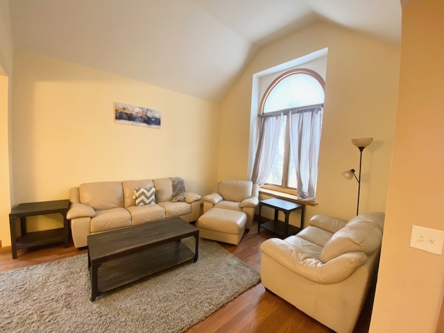 1702 Elm Street Spring Grove, IL 60081 - Photo 3 of 30 a living room with furniture and a window