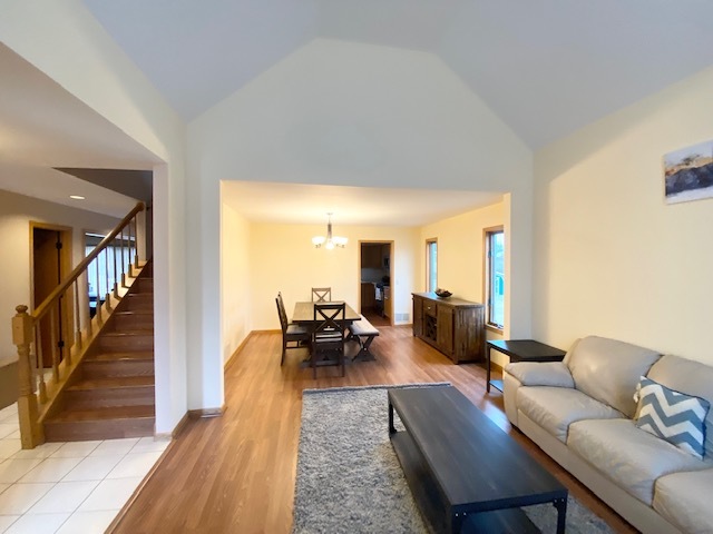 1702 Elm Street Spring Grove, IL 60081 - Photo 5 of 30 a living room with furniture and a table