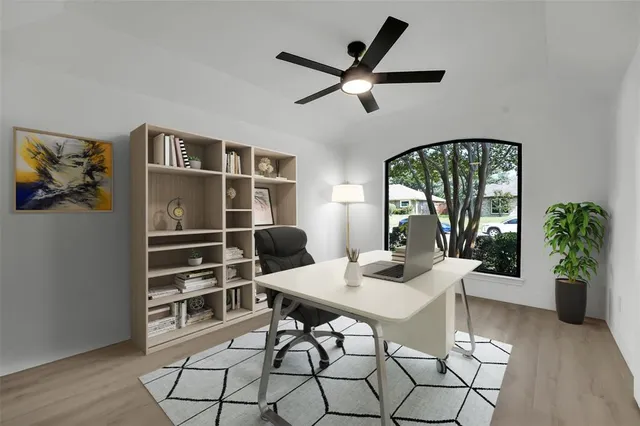 a workspace with furniture window and wooden floor