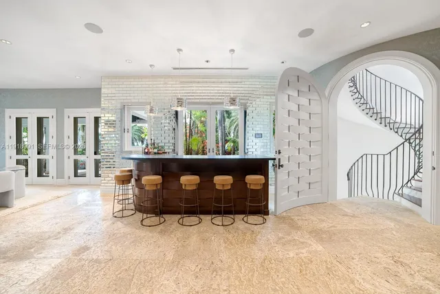 en empty room with window and fireplace