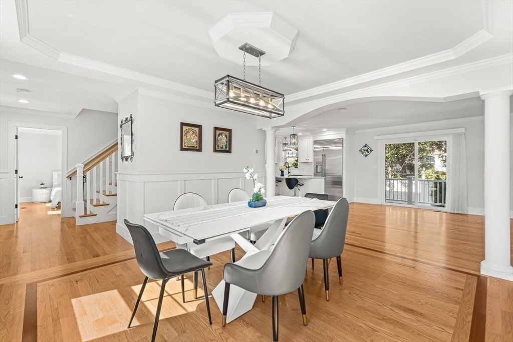 237 Swanton Street Winchester, MA 01890 - Photo 11 of 34 a view of a dining room with furniture and wooden floor