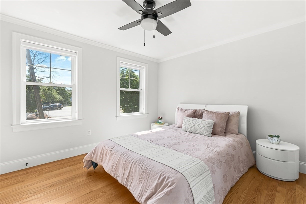 237 Swanton Street Winchester, MA 01890 - Photo 13 of 34 a bedroom with a bed and a window