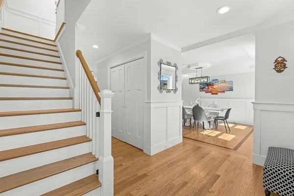 a view of a living room and entryway