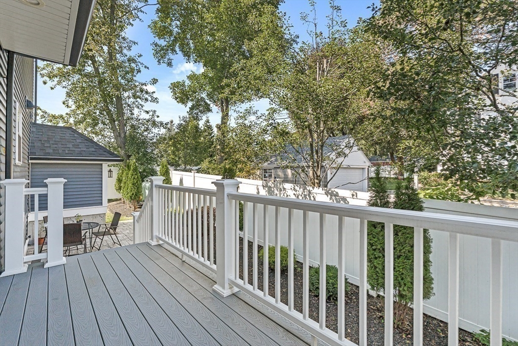 237 Swanton Street Winchester, MA 01890 - Photo 33 of 34 a view of a wooden deck and a yard