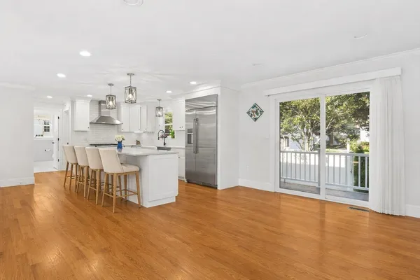 a view of a kitchen and dining room
