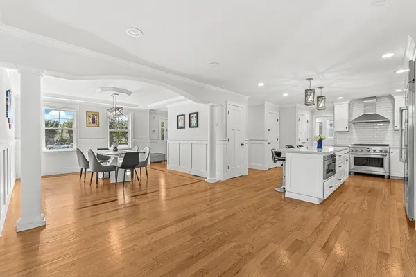 a view of kitchen with furniture and wooden floor