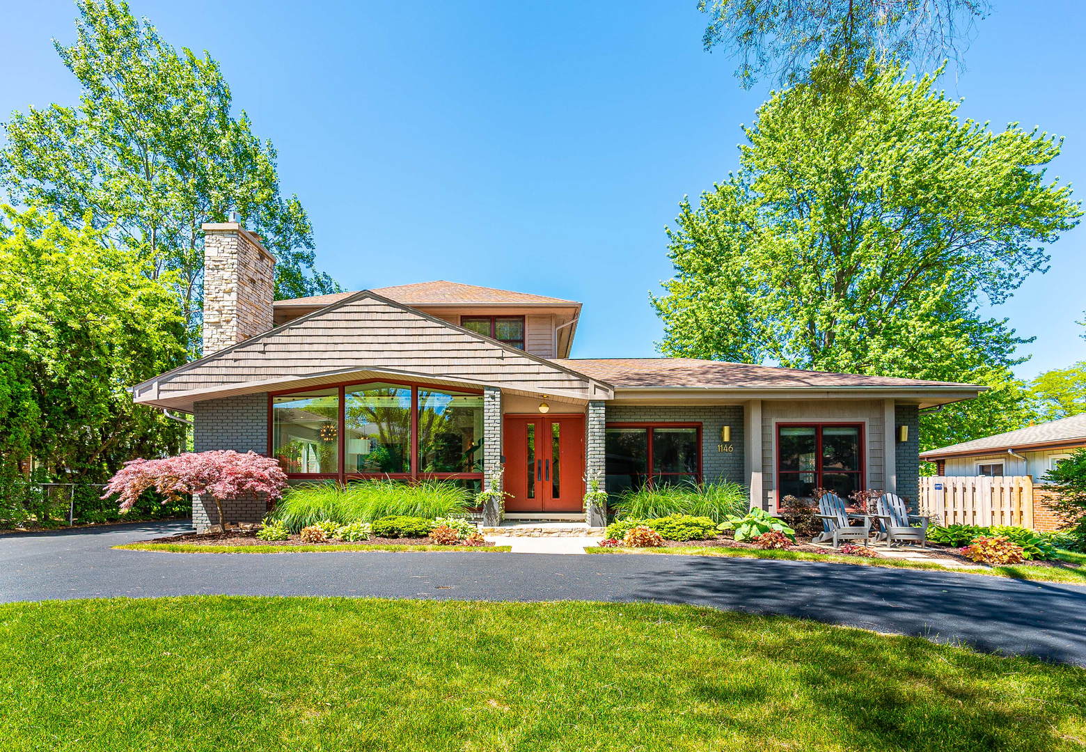 1146 Rago Avenue Deerfield, IL 60015 - Photo 1 of 25 a front view of a house with garden