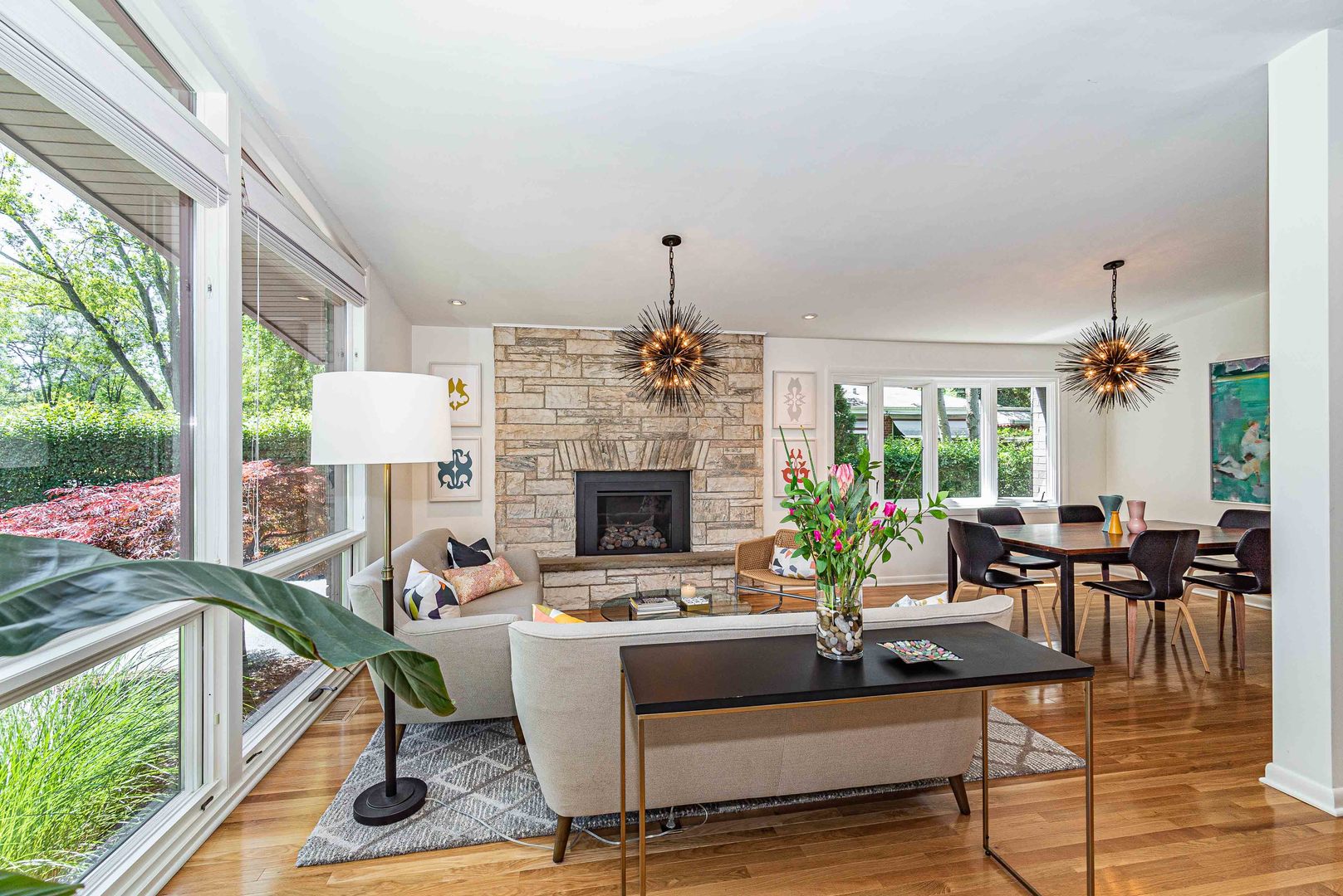 1146 Rago Avenue Deerfield, IL 60015 - Photo 2 of 25 a living room with furniture a fireplace and a floor to ceiling window