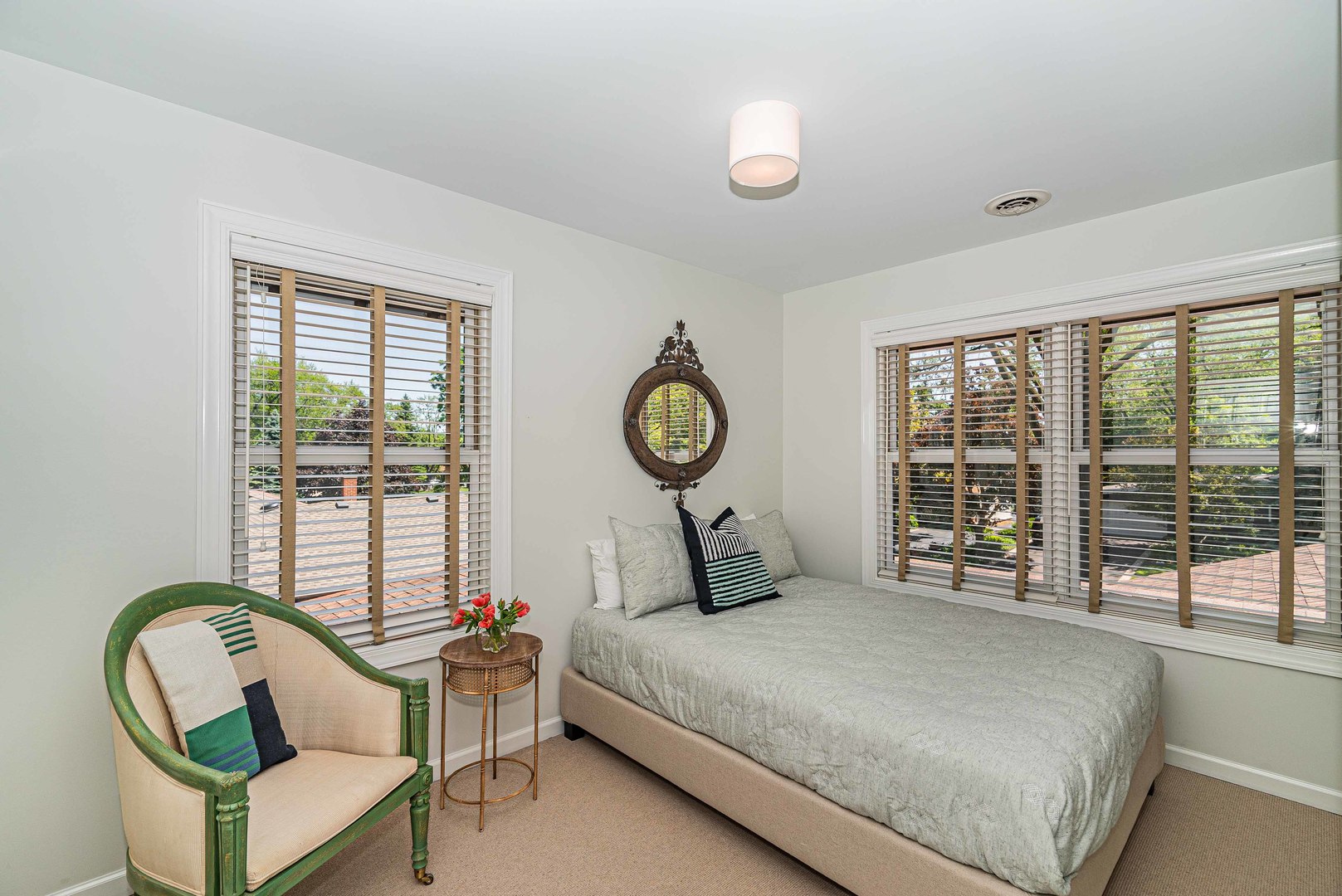 1146 Rago Avenue Deerfield, IL 60015 - Photo 17 of 25 a bed sitting in a bedroom next to a window