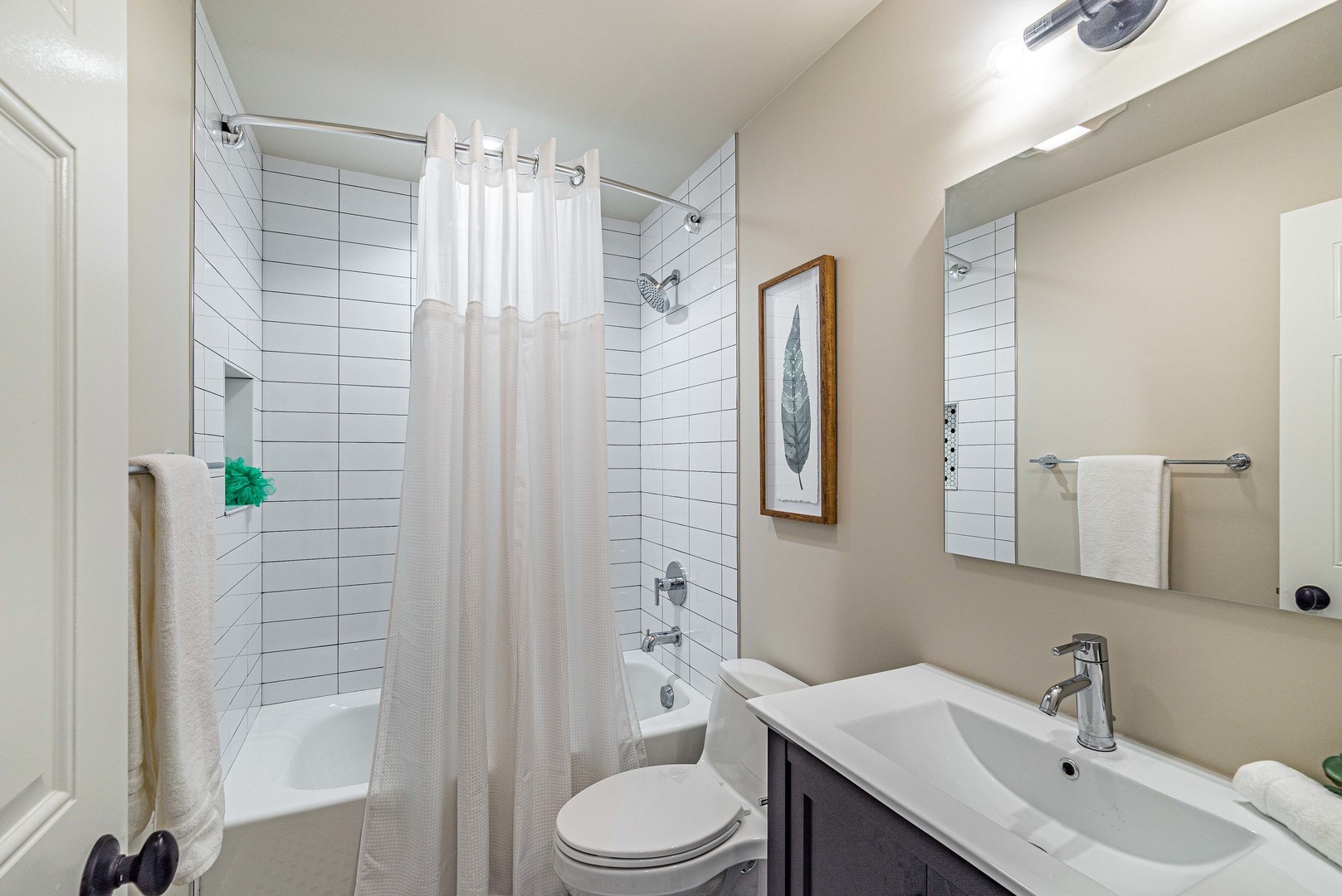 1146 Rago Avenue Deerfield, IL 60015 - Photo 18 of 25 a bathroom with a sink toilet and shower
