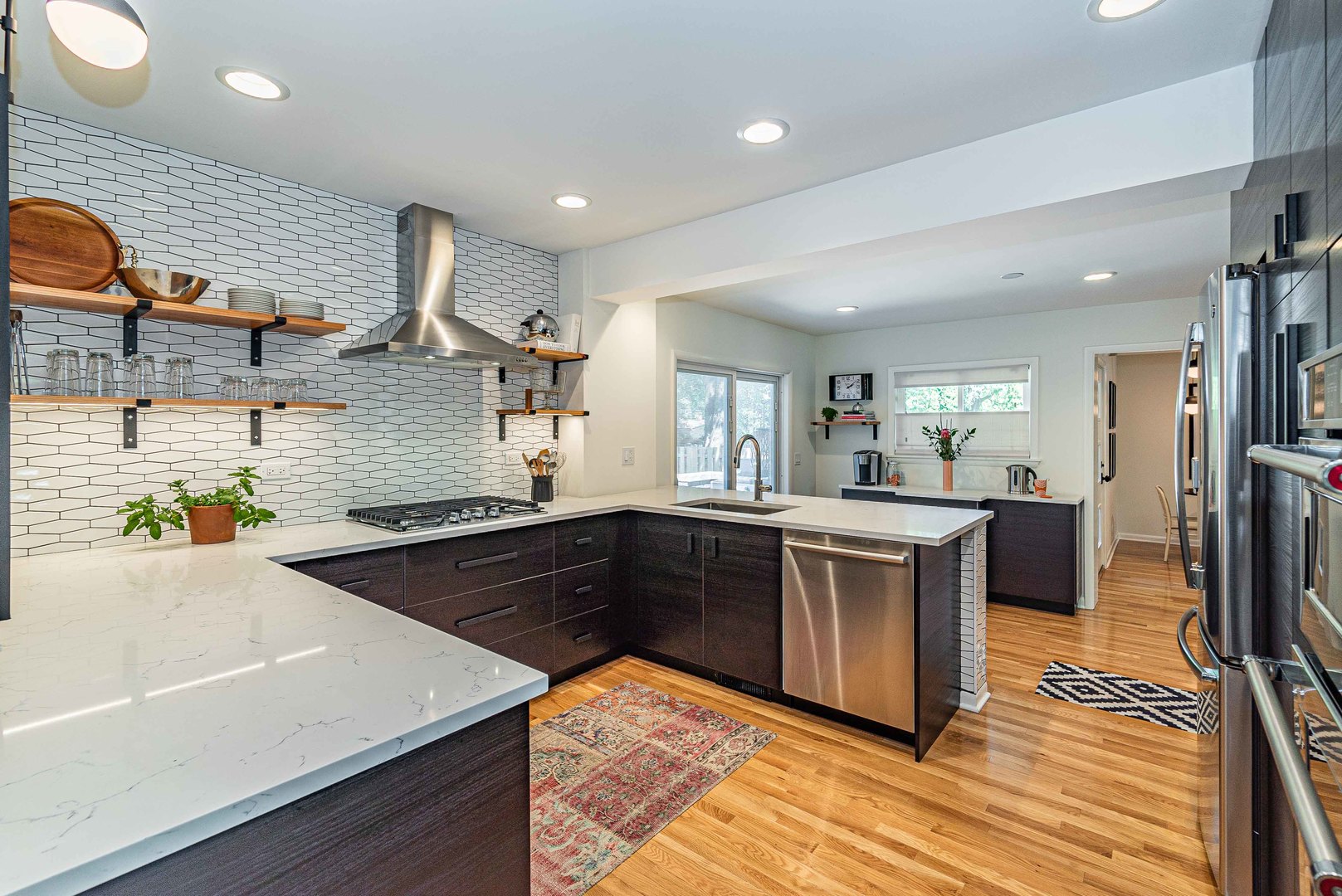 1146 Rago Avenue Deerfield, IL 60015 - Photo 6 of 25 a kitchen with stainless steel appliances granite countertop a sink stove and refrigerator
