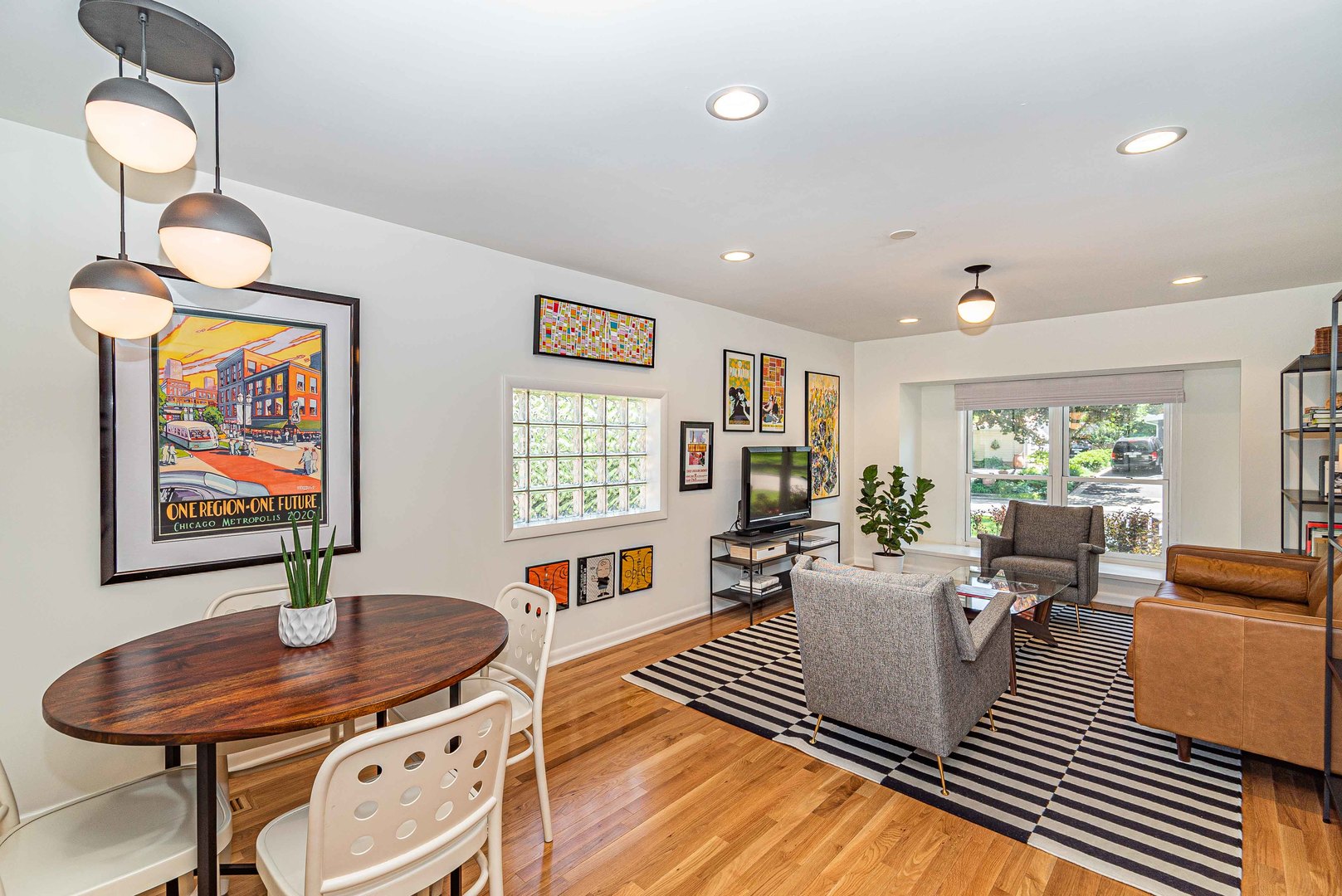 1146 Rago Avenue Deerfield, IL 60015 - Photo 8 of 25 a living room with fireplace furniture and a potted plant
