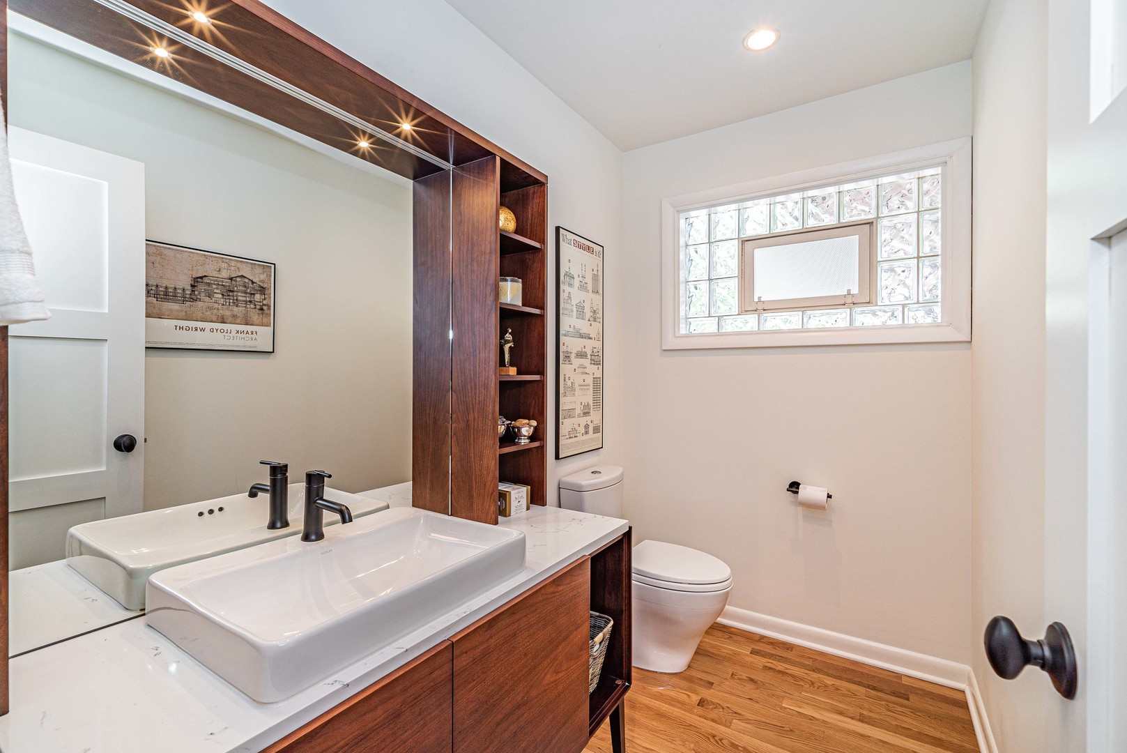 1146 Rago Avenue Deerfield, IL 60015 - Photo 9 of 25 a bathroom with a sink a toilet and shower
