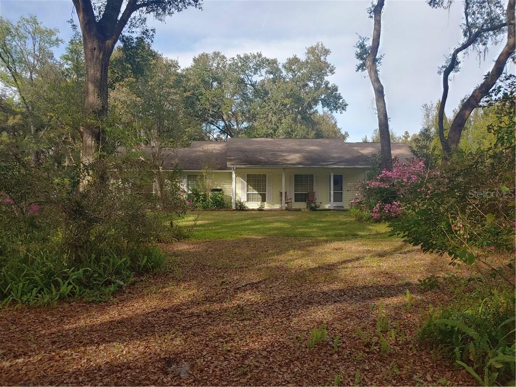 2025 Pine Ridge Dairy Road Fruitland Park, FL 34731 - Photo 1 of 1 Enjoy an iced tea relaxing on your front porch overlooking the beautiful grounds!