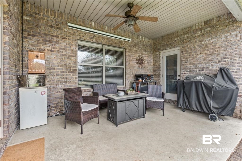 2570 Pecan Pointe Drive Semmes, AL 36575 - Photo 17 of 22 View of patio / terrace featuring a ceiling fan, an outdoor living space, and area for grilling