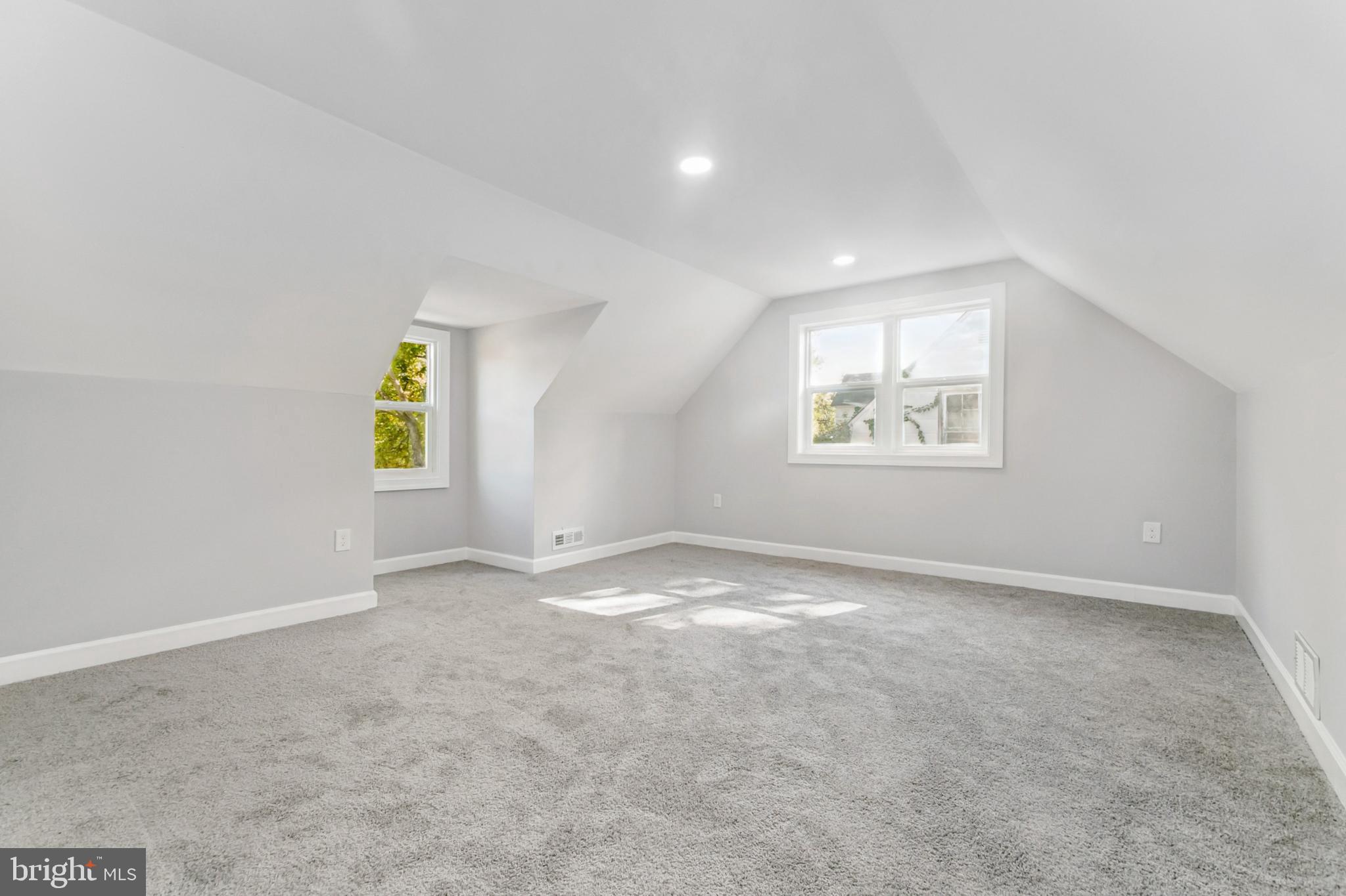 6804 Carol Road Baltimore, MD 21207 - Photo 16 of 25 Bright and airy attic space with potential.