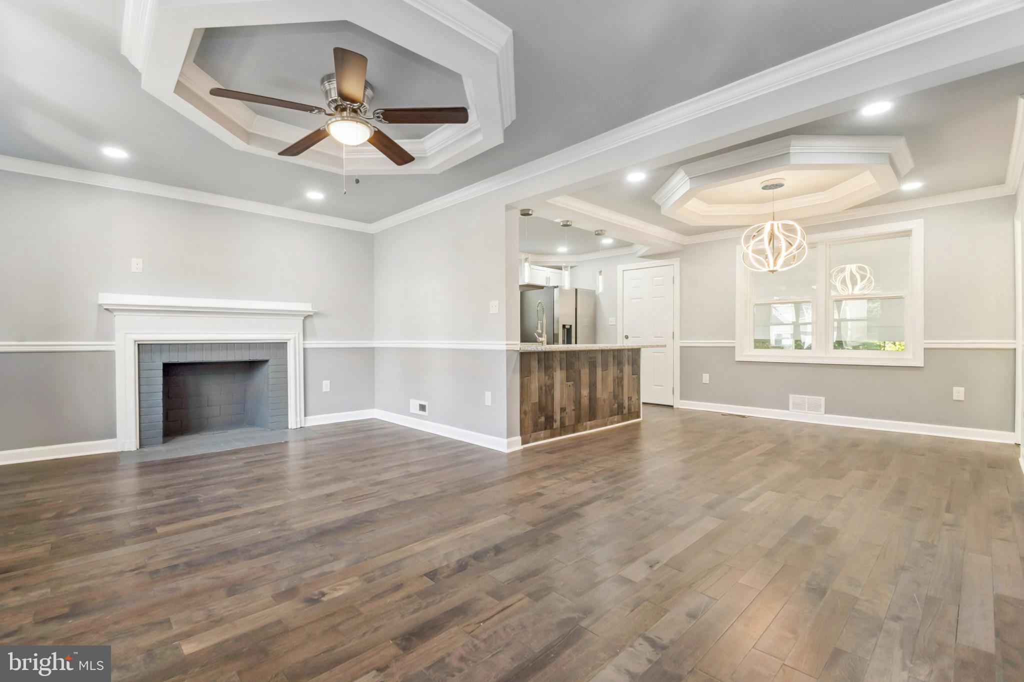 6804 Carol Road Baltimore, MD 21207 - Photo 2 of 25 Spacious living area with elegant details.
