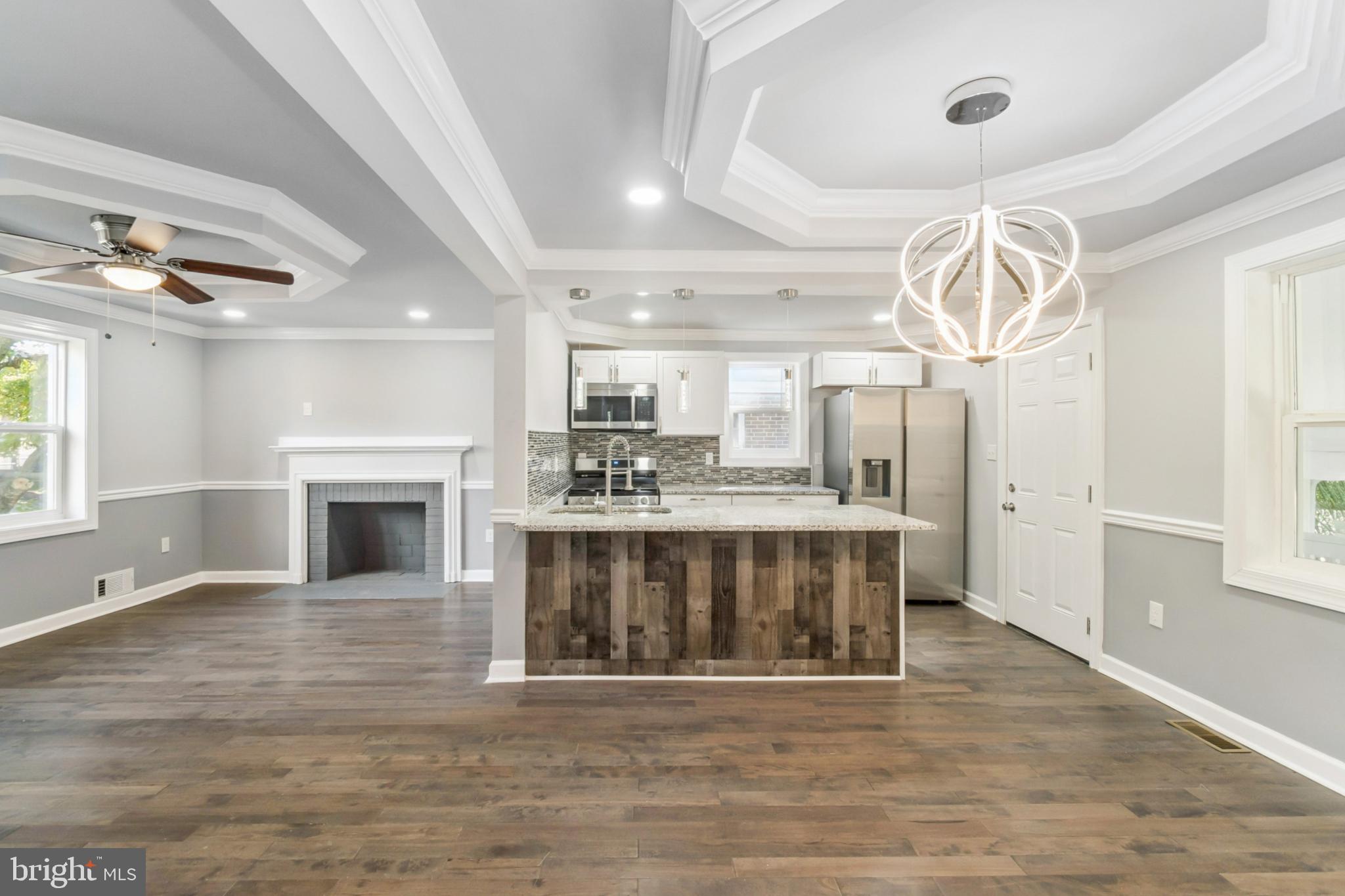 6804 Carol Road Baltimore, MD 21207 - Photo 4 of 25 Modern elegance in an open living space.