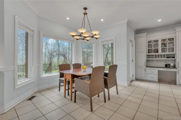 a dining room well furnished