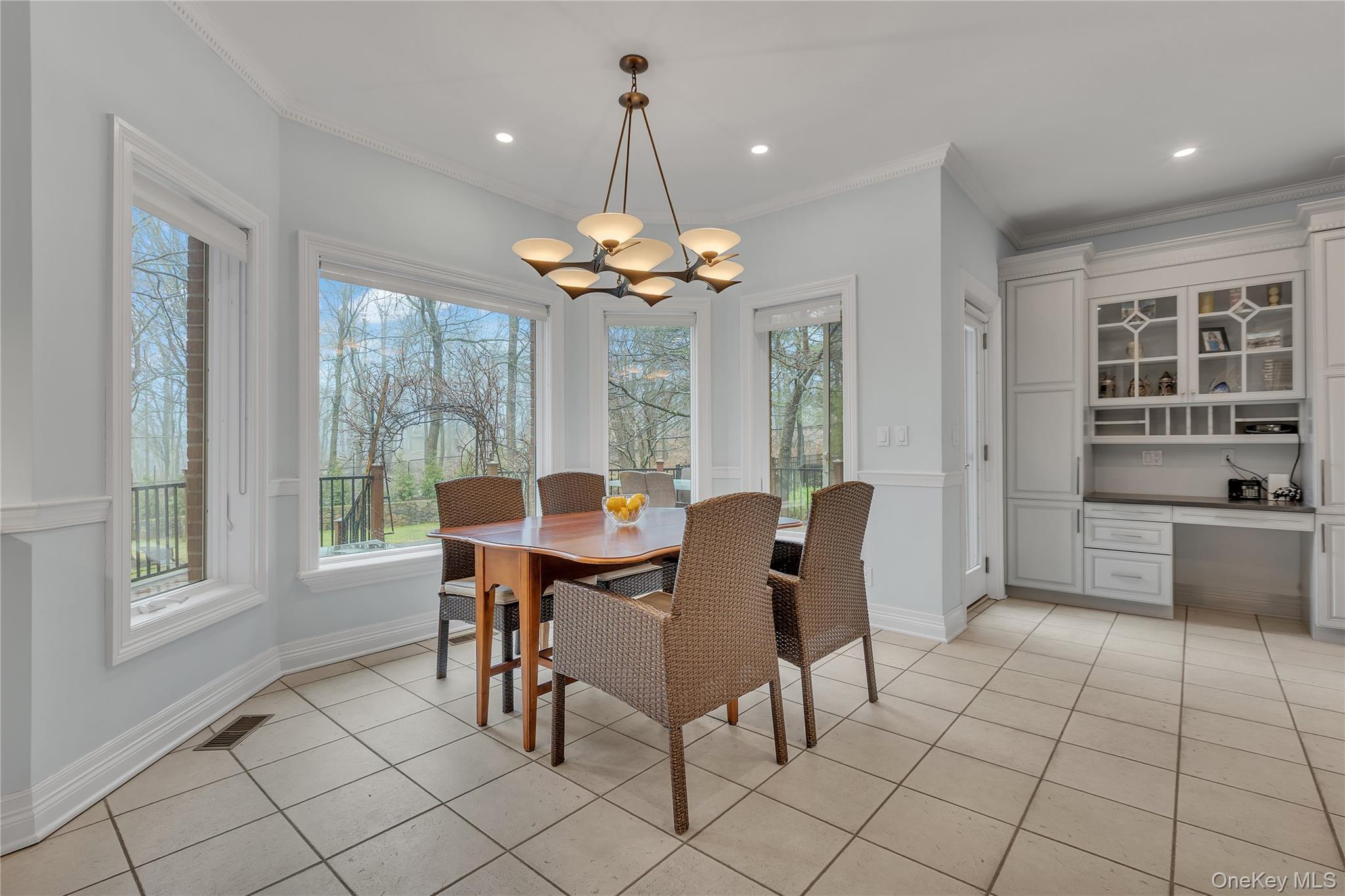 199 Hirst Road Briarcliff Manor, NY 10510 - Photo 11 of 50 The breakfast area also faces a useful desk area in the Kitchen, and a door out to the Trex Deck.