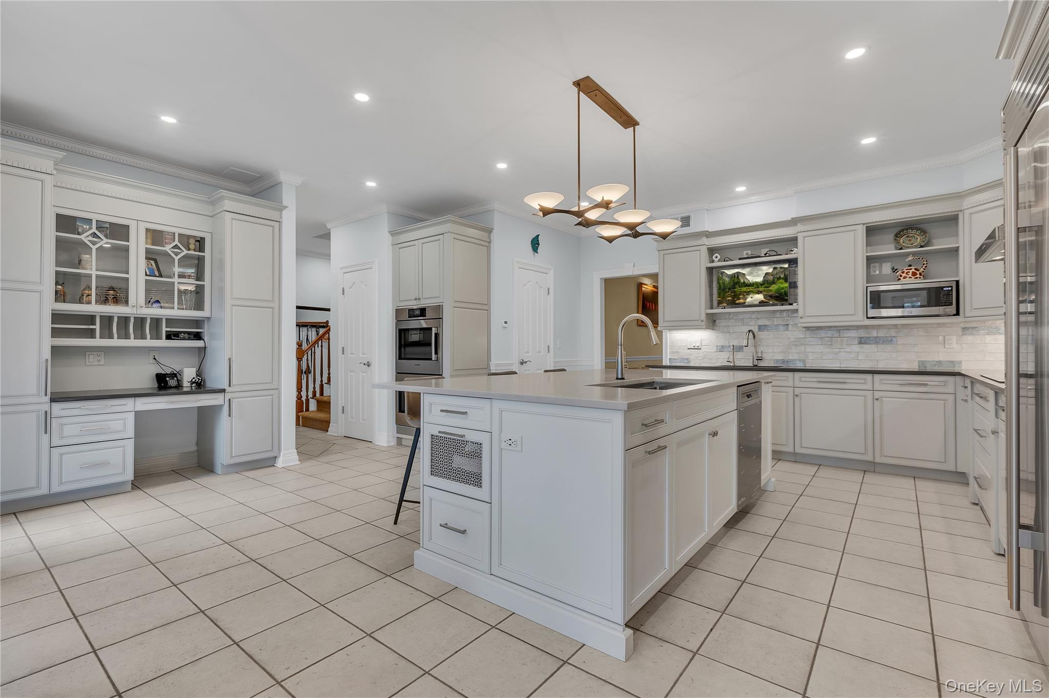 199 Hirst Road Briarcliff Manor, NY 10510 - Photo 12 of 50 Another glance at your dream Kitchen, with a view towards the Walk-in Pantry and the hall to the Laundry Room, 3 car garage entry & main floor BR/Bathroom area, perfect for an au pair, in law or guest.