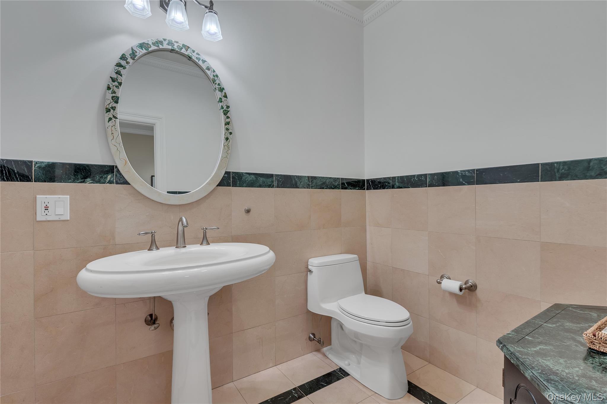 199 Hirst Road Briarcliff Manor, NY 10510 - Photo 18 of 50 Tiled Powder Room on main floor with pedestal sink.