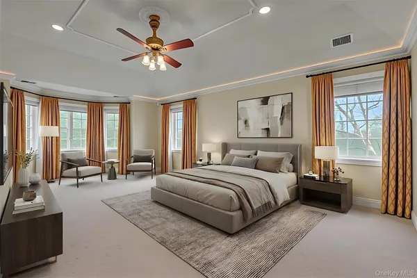 a spacious bedroom with a large bed and a large window