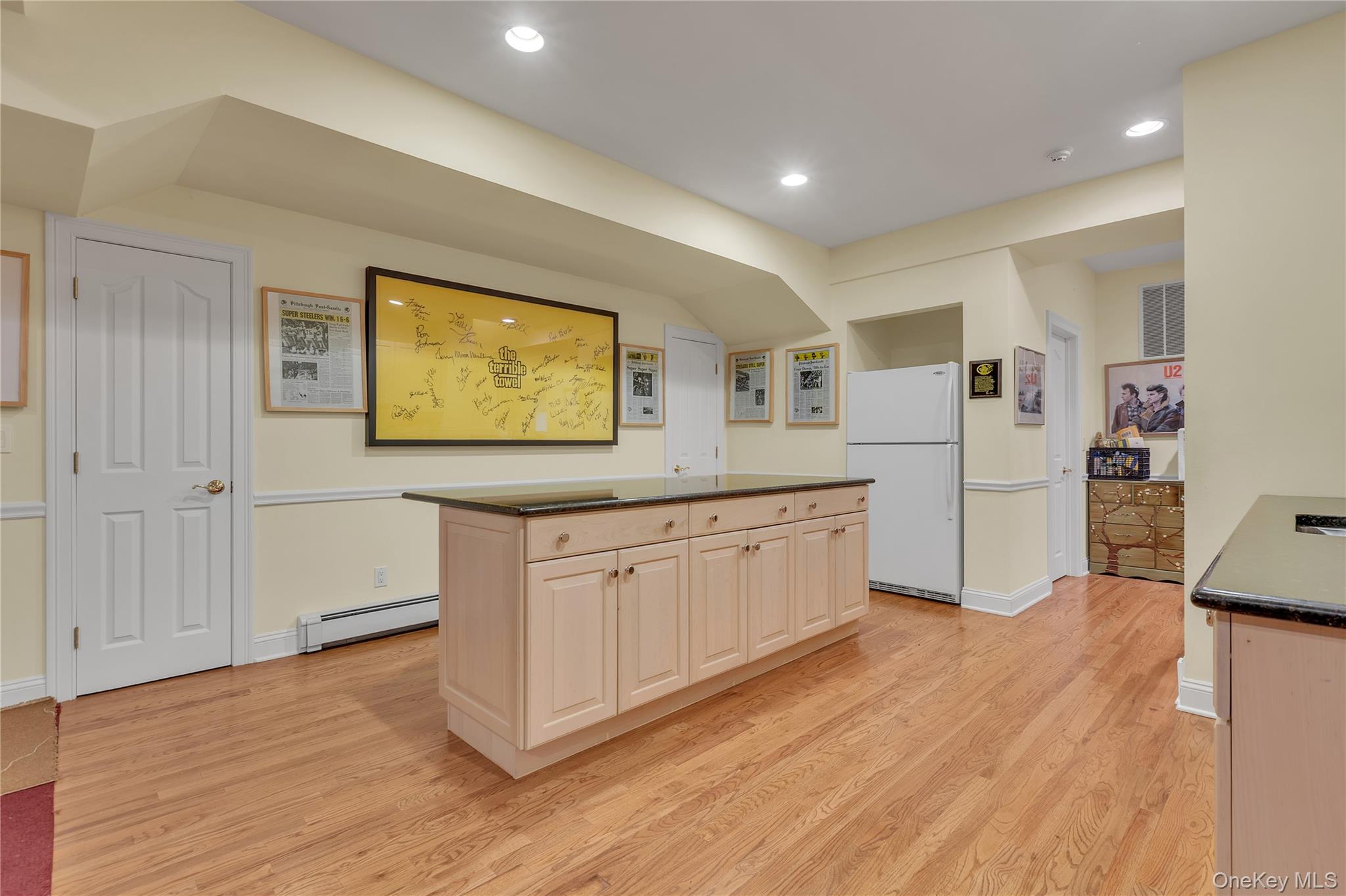 199 Hirst Road Briarcliff Manor, NY 10510 - Photo 43 of 50 Lower Level entertaining Kitchen including a center island/breakfast bar, sink counter, refrigerator and walk-in pantry closet.