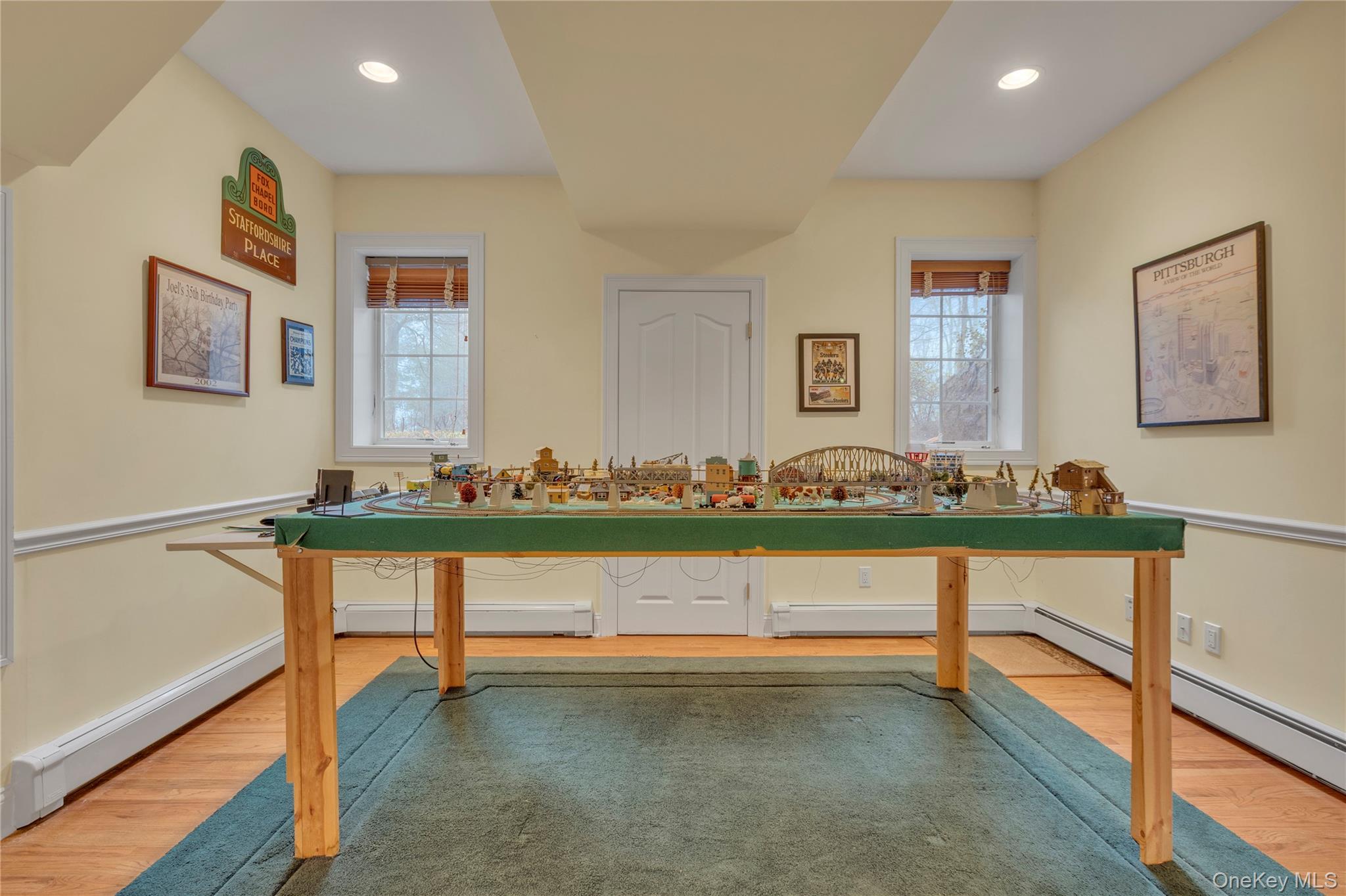 199 Hirst Road Briarcliff Manor, NY 10510 - Photo 44 of 50 Another room in the lower level--currently used for a model train table set, this room offers privacy with double doors & has a closet and shelf nooks as well as recessed lighting.