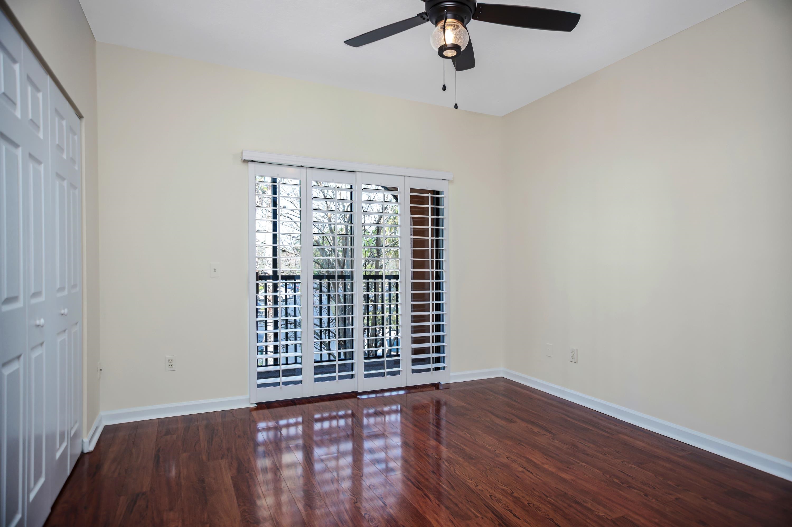 3327 Haley Pointe Road, Unit 3327 St. Augustine, FL 32084 - Photo 17 of 27 wooden floor in an empty room with a window