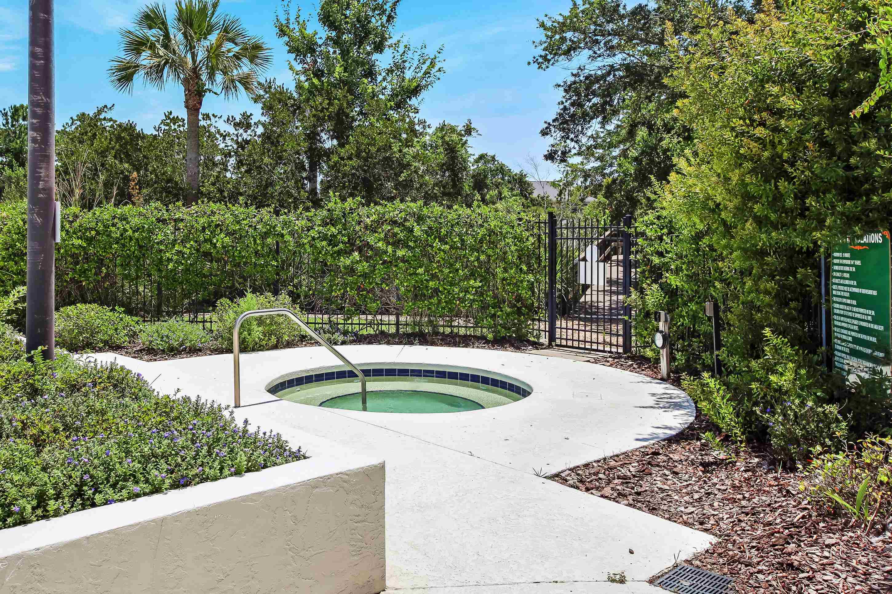 3327 Haley Pointe Road, Unit 3327 St. Augustine, FL 32084 - Photo 23 of 27 a view of a backyard with potted plants