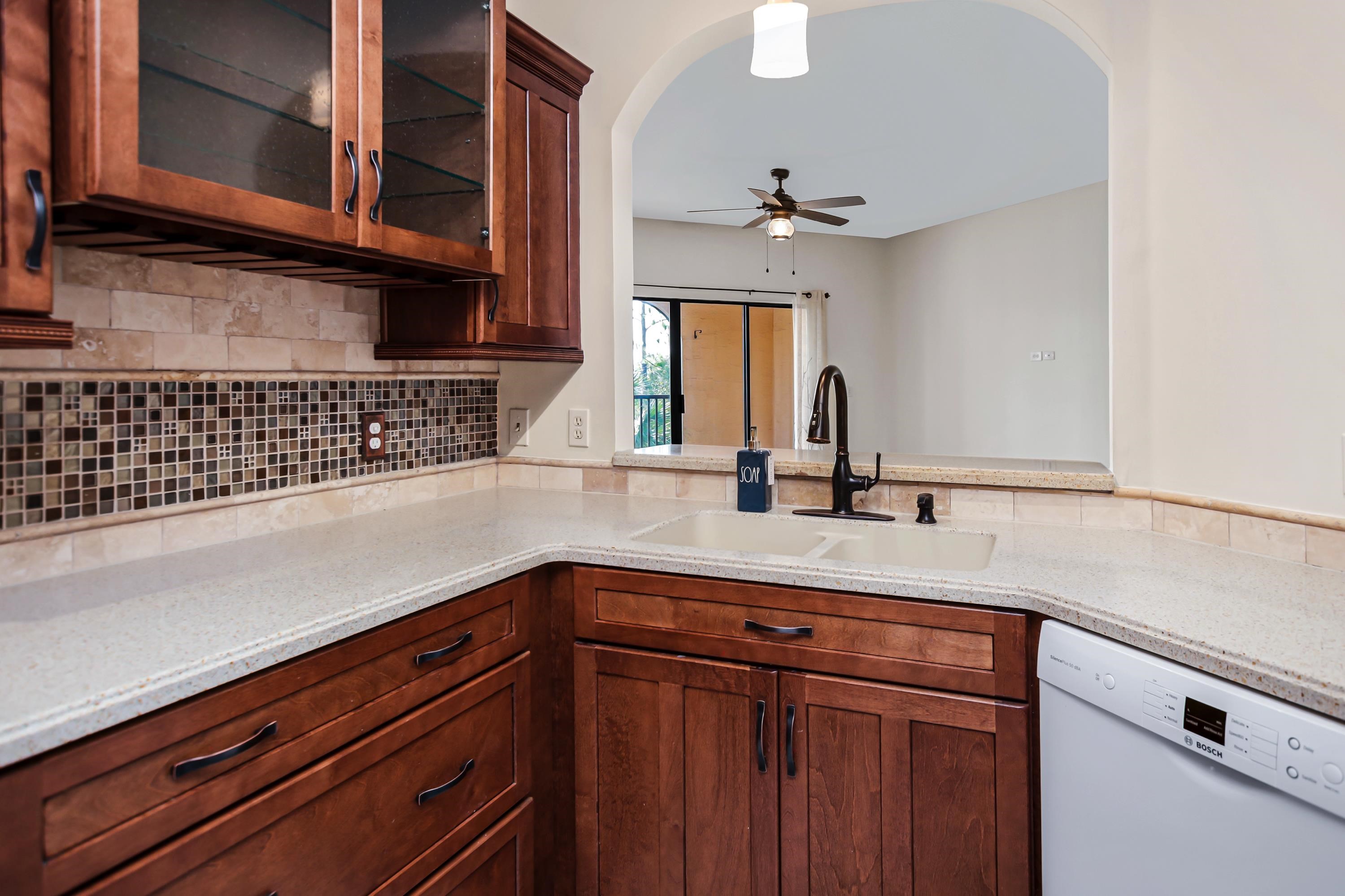 3327 Haley Pointe Road, Unit 3327 St. Augustine, FL 32084 - Photo 10 of 27 a kitchen with a sink and cabinets