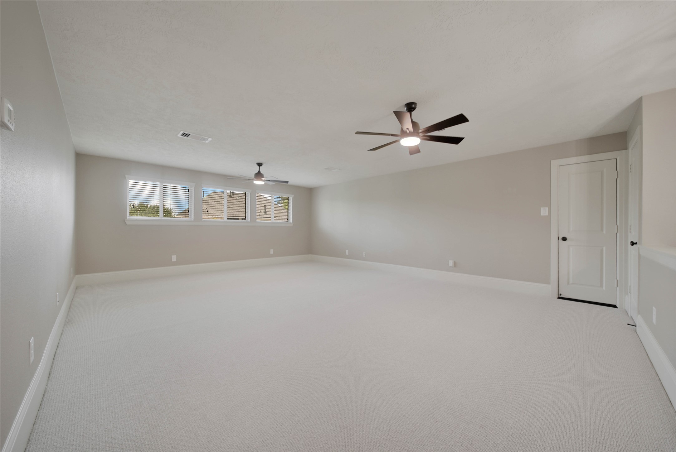 1215 Jake Springs Court Spring, TX 77386 - Photo 27 of 49 Head upstairs where you find this enormous gameroom!