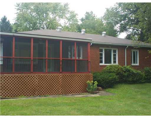 427 Blackhawk Road Beaver Falls, PA 15010 - Photo 18 of 19 Exterior Back. The back of teh home showing the screened porch accessed from the kitchen or side yard