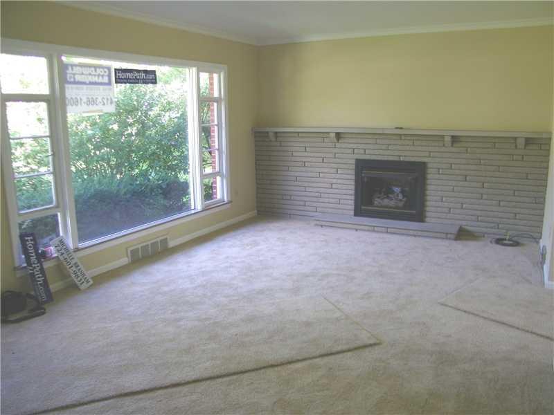 427 Blackhawk Road Beaver Falls, PA 15010 - Photo 3 of 19 Living Room. The large picture window floods the living room with natural light!