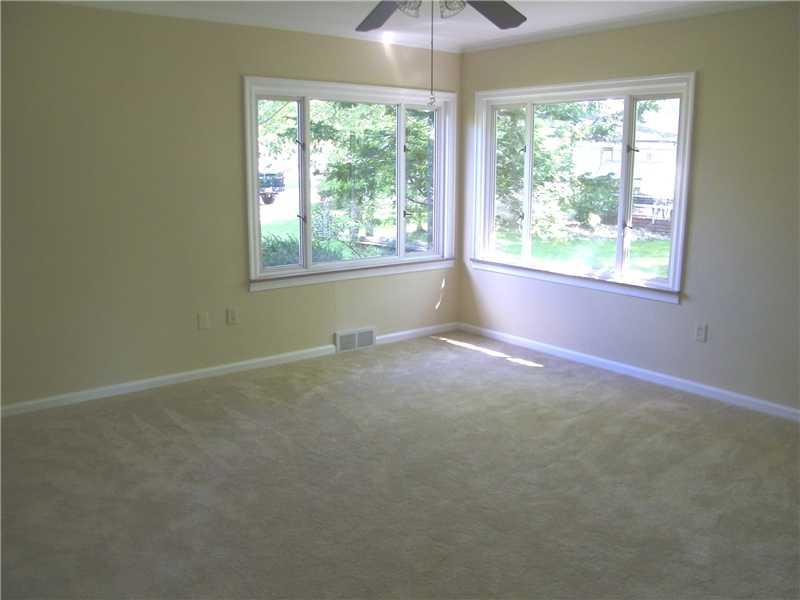 427 Blackhawk Road Beaver Falls, PA 15010 - Photo 8 of 19 Bedroom. The main bedroom is suffused with light from the double exposure windows! The new beige carpeting continues here and also crown moldings. A lighted ceiling fan will lend a gentle breeze when needed.