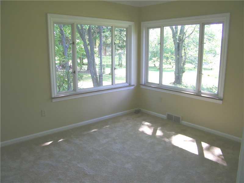 427 Blackhawk Road Beaver Falls, PA 15010 - Photo 10 of 19 Bedroom. The second bedroom is a the back of the home and has large windows that overlook the level lot. This room also has new carpeting and crown moldings