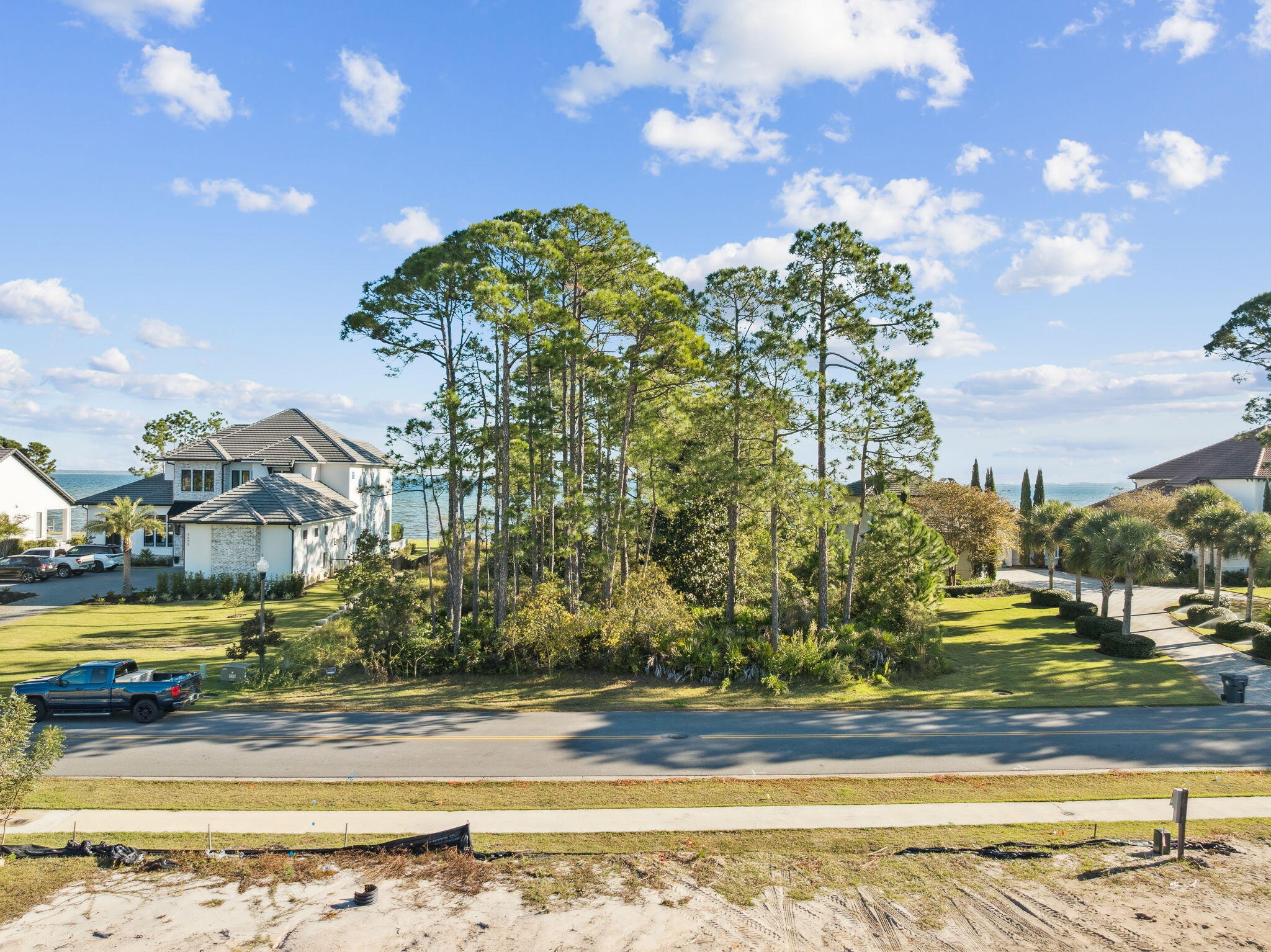 Lot 1-4th Driftwood Point Road Santa Rosa Beach, FL 32459 - Photo 11 of 14 a view of a yard with swimming pool and trees