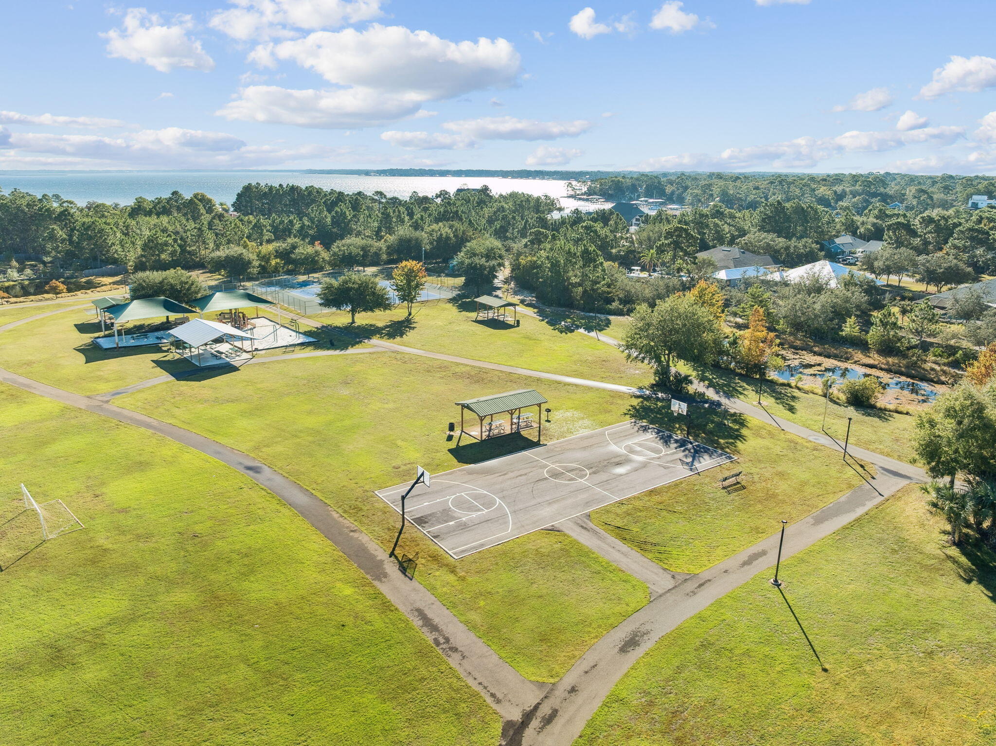 Lot 1-4th Driftwood Point Road Santa Rosa Beach, FL 32459 - Photo 13 of 14 a view of a swimming pool with an ocean view