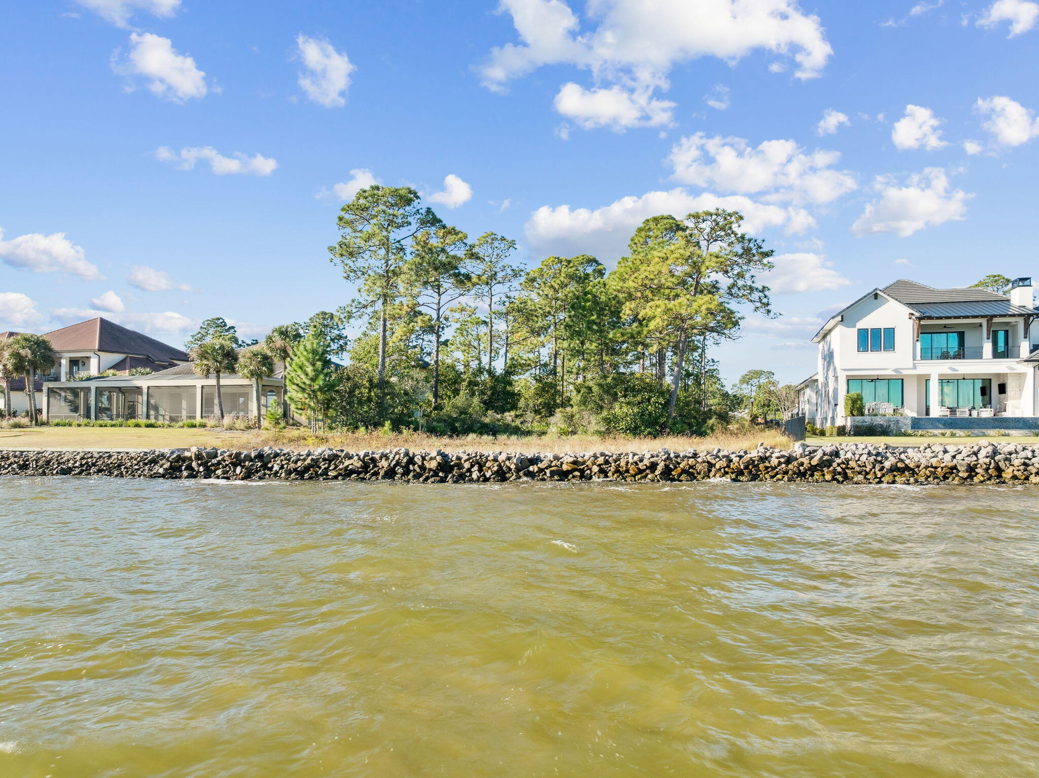 Lot 1-4th Driftwood Point Road Santa Rosa Beach, FL 32459 - Photo 10 of 14 a front view of a house with a ocean view