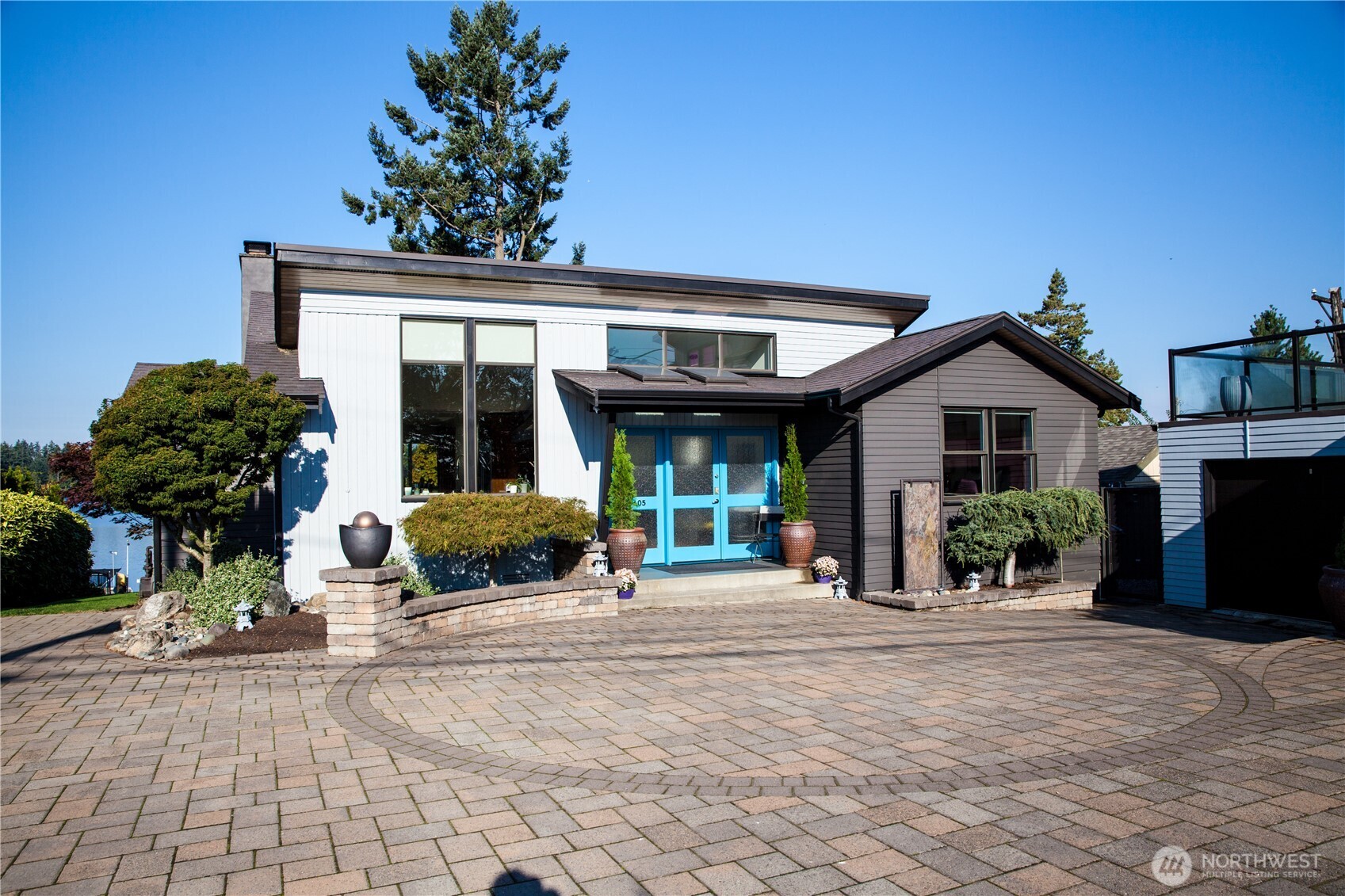 19605 Military Road South SeaTac, WA 98188 - Photo 1 of 40 a view of a house with a patio