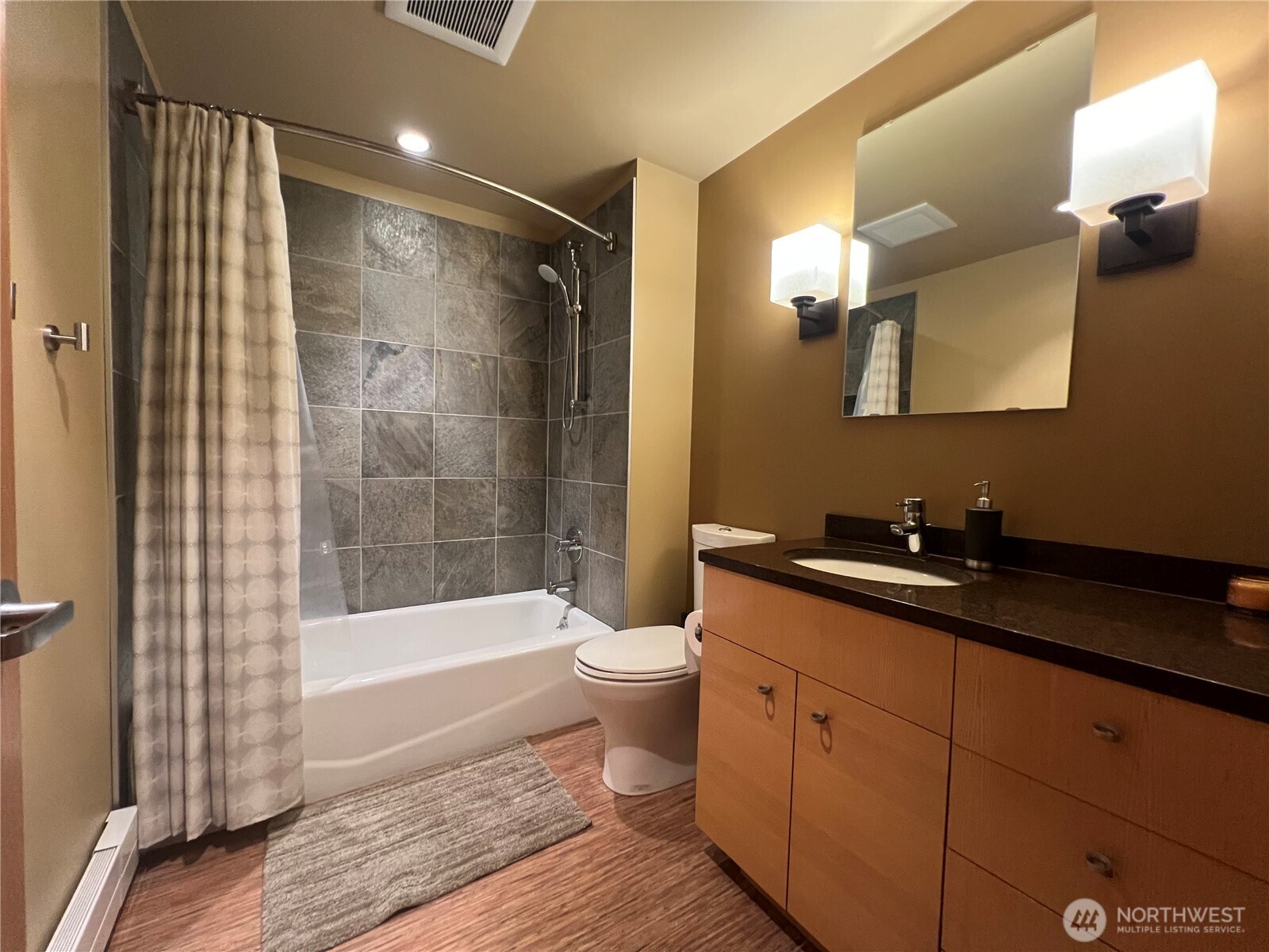 19605 Military Road South SeaTac, WA 98188 - Photo 29 of 40 a bathroom with a double vanity sink toilet and shower