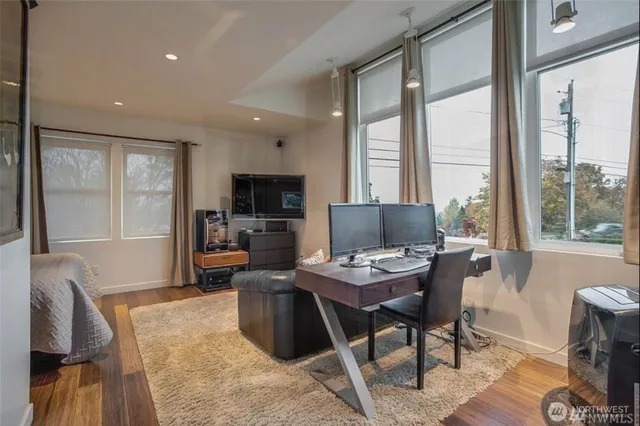 a workspace with furniture window and outside view