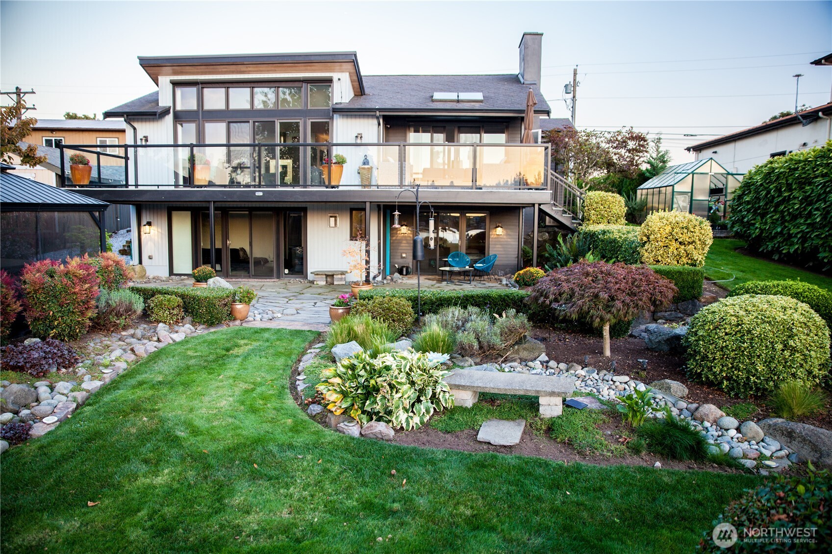 19605 Military Road South SeaTac, WA 98188 - Photo 35 of 40 a front view of a house with a garden and plants