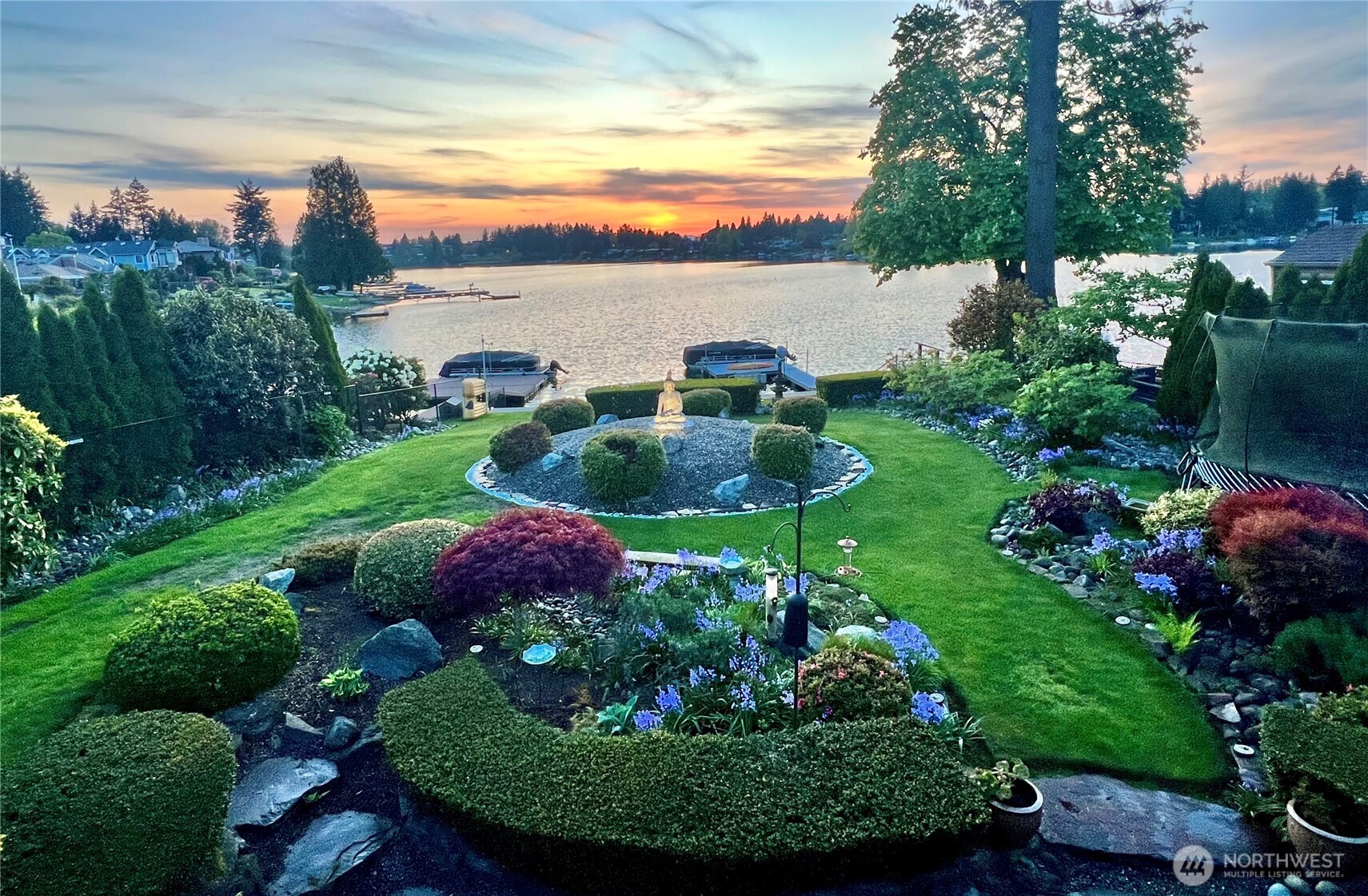 19605 Military Road South SeaTac, WA 98188 - Photo 37 of 40 a view of a garden with a lake view