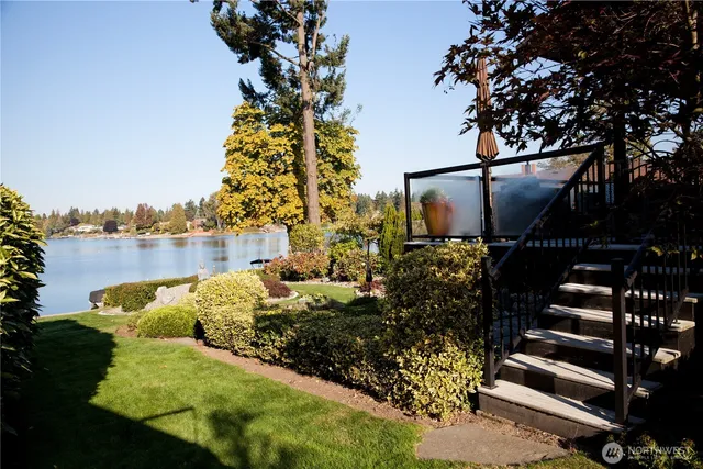 a view of a lake with a garden