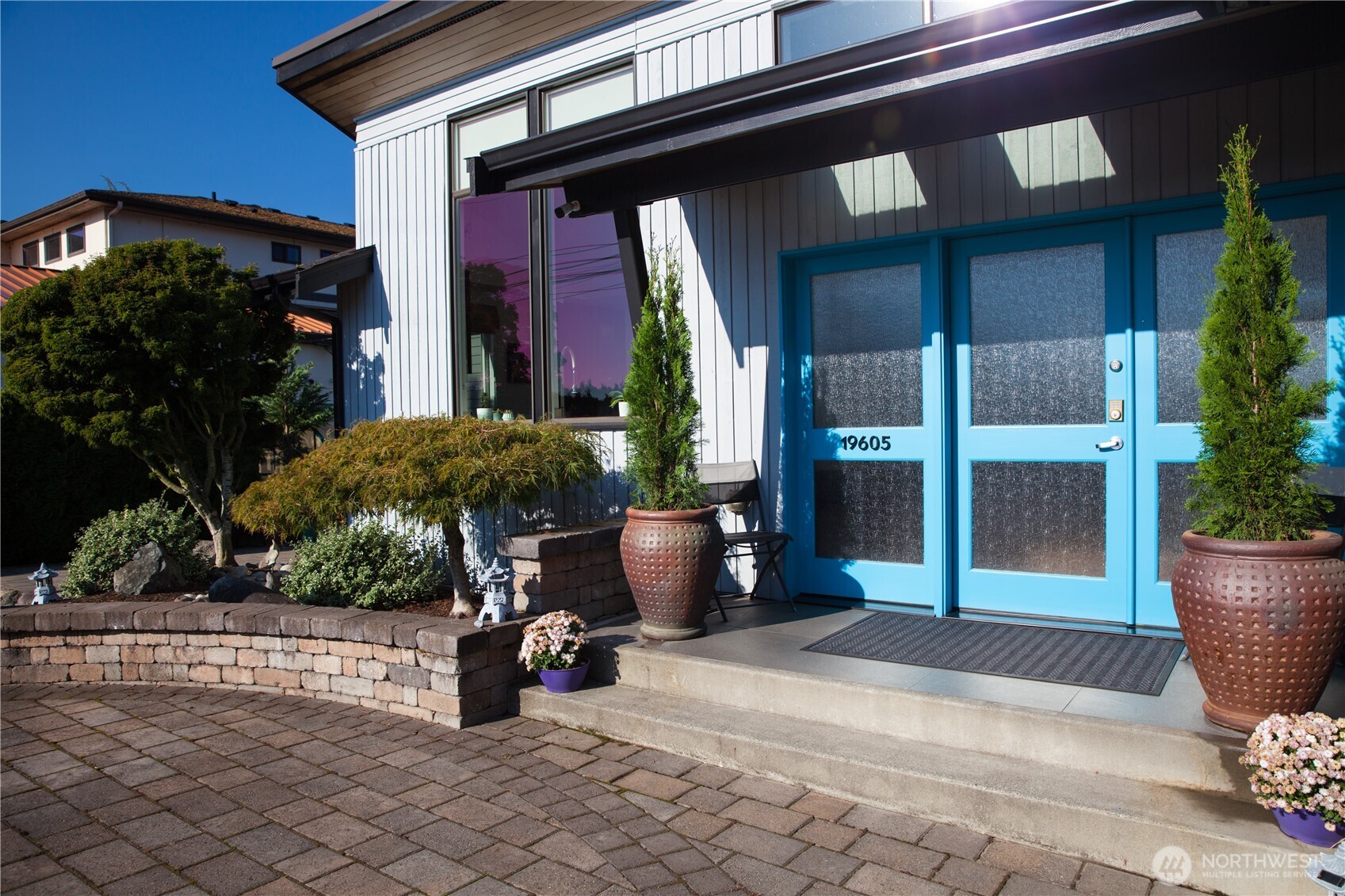 19605 Military Road South SeaTac, WA 98188 - Photo 6 of 40 a view of building with potted plants