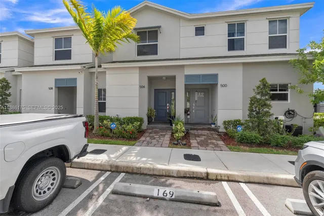 a bedroom with a bed and a tv